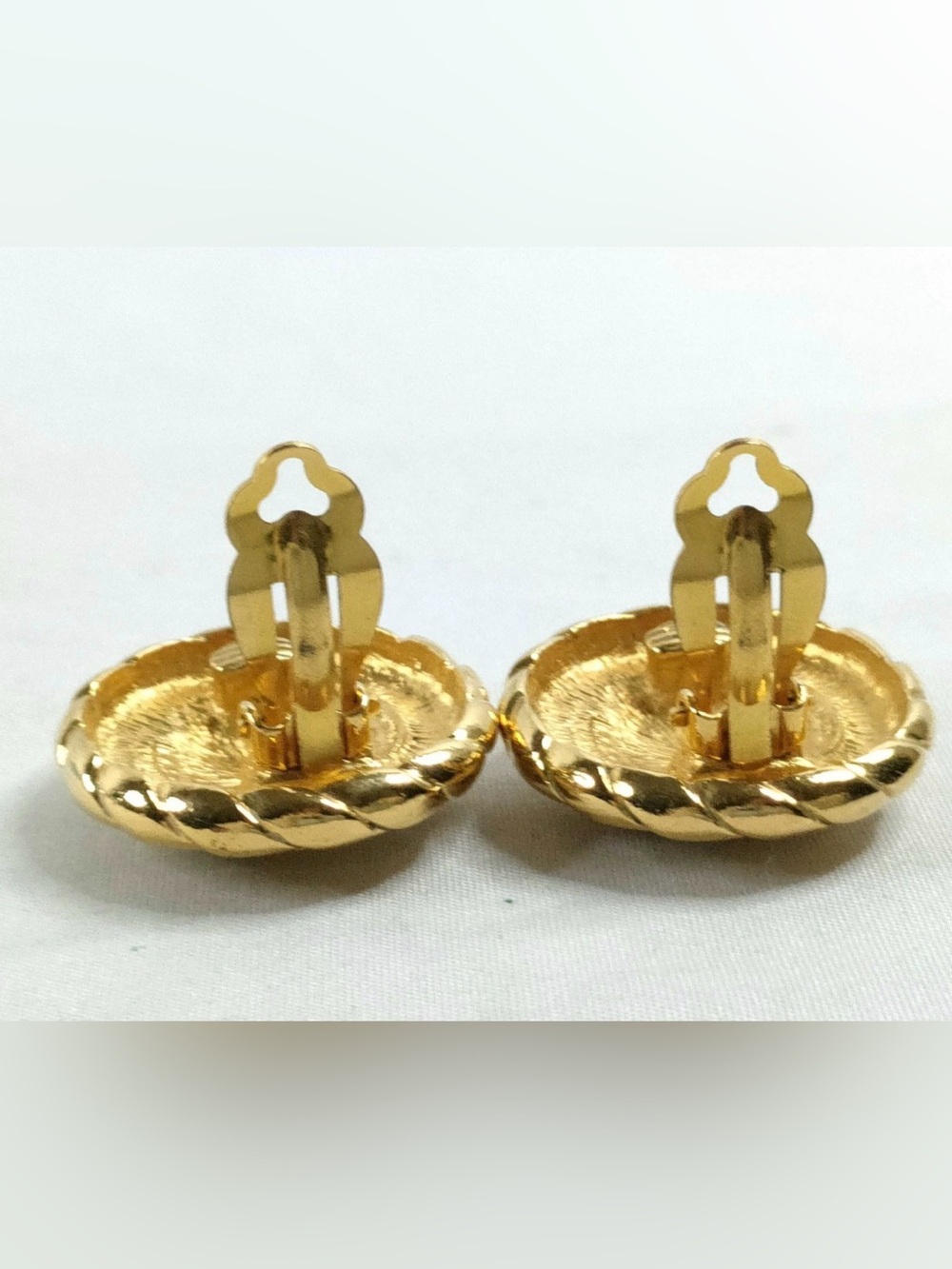 A Pair of Vintage Chanel Gold-Tone CC Medallion Button Clip-On Earrings - Picture 7 of 10